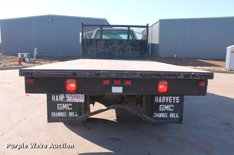 image for item DB5075 1999 GMC 7500 flat dump bed truck