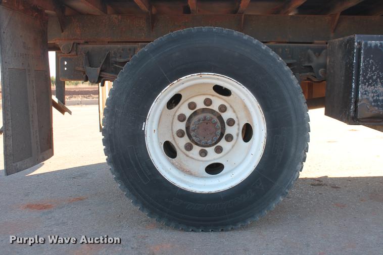 image for item DB5075 1999 GMC 7500 flat dump bed truck