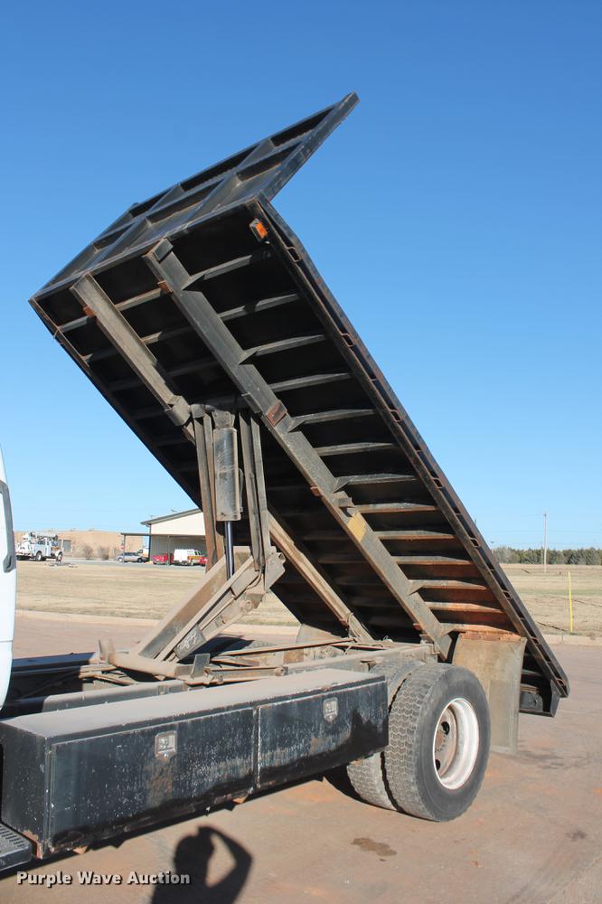 image for item DB5075 1999 GMC 7500 flat dump bed truck