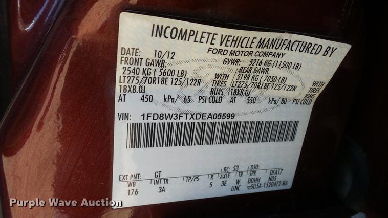 image for item DC0504 2013 Ford F350 Super Duty Crew Cab flatbed pickup truck