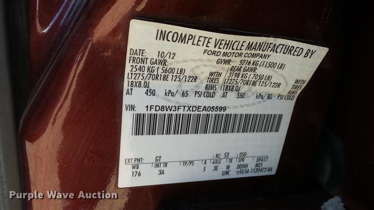 image for item DC0504 2013 Ford F350 Super Duty Crew Cab flatbed pickup truck