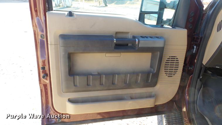 image for item DC0504 2013 Ford F350 Super Duty Crew Cab flatbed pickup truck