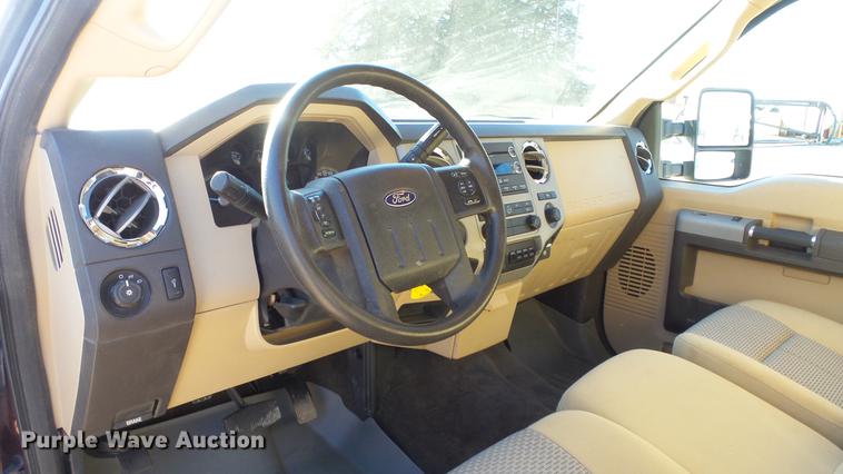 image for item DC0504 2013 Ford F350 Super Duty Crew Cab flatbed pickup truck