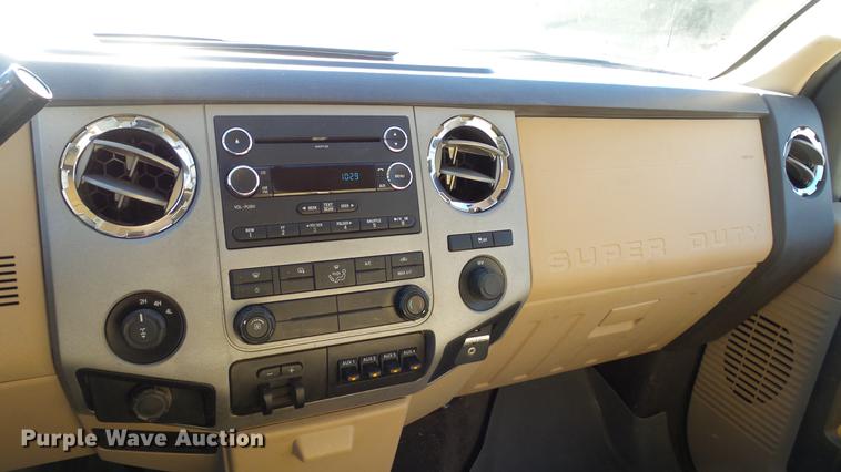 image for item DC0504 2013 Ford F350 Super Duty Crew Cab flatbed pickup truck