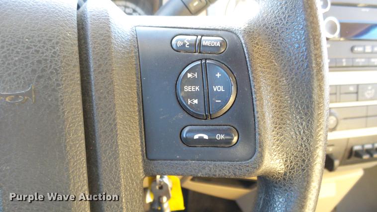 image for item DC0504 2013 Ford F350 Super Duty Crew Cab flatbed pickup truck