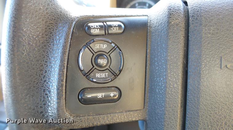 image for item DC0504 2013 Ford F350 Super Duty Crew Cab flatbed pickup truck