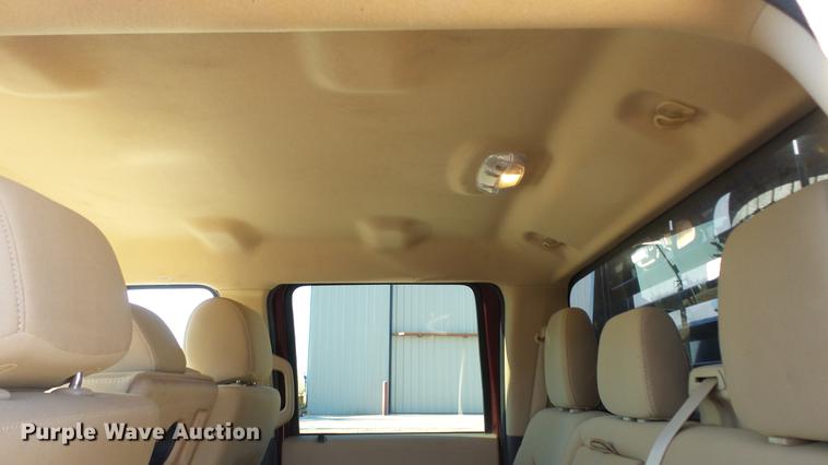 image for item DC0504 2013 Ford F350 Super Duty Crew Cab flatbed pickup truck