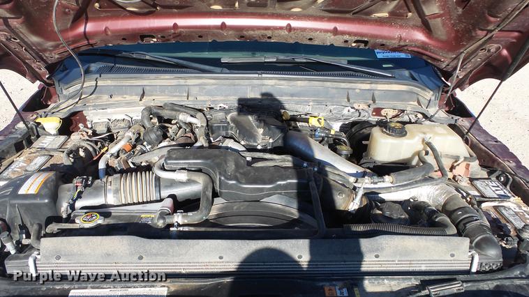 image for item DC0504 2013 Ford F350 Super Duty Crew Cab flatbed pickup truck