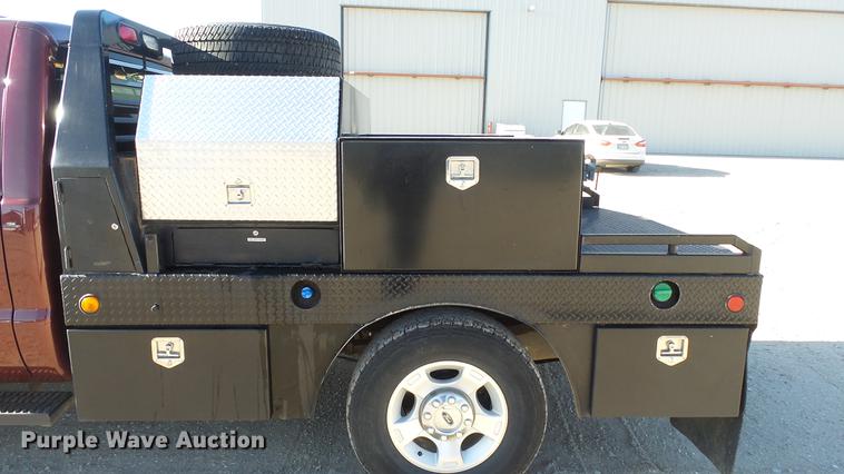 image for item DC0504 2013 Ford F350 Super Duty Crew Cab flatbed pickup truck