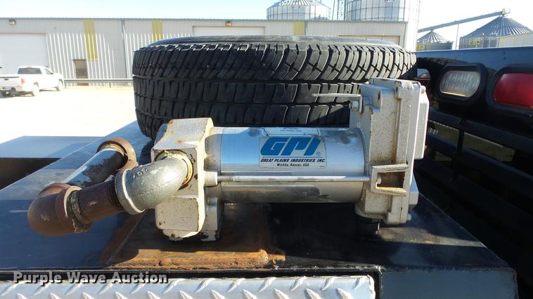 image for item DC0504 2013 Ford F350 Super Duty Crew Cab flatbed pickup truck