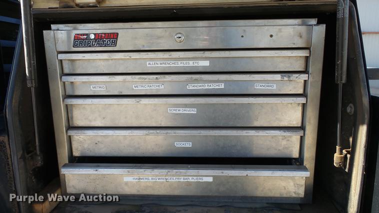 image for item DC0504 2013 Ford F350 Super Duty Crew Cab flatbed pickup truck