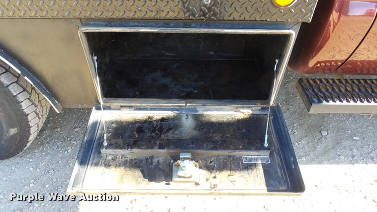 image for item DC0504 2013 Ford F350 Super Duty Crew Cab flatbed pickup truck