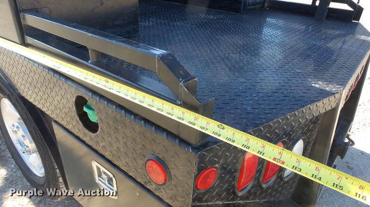 image for item DC0504 2013 Ford F350 Super Duty Crew Cab flatbed pickup truck