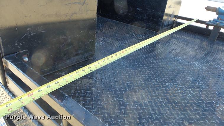 image for item DC0504 2013 Ford F350 Super Duty Crew Cab flatbed pickup truck