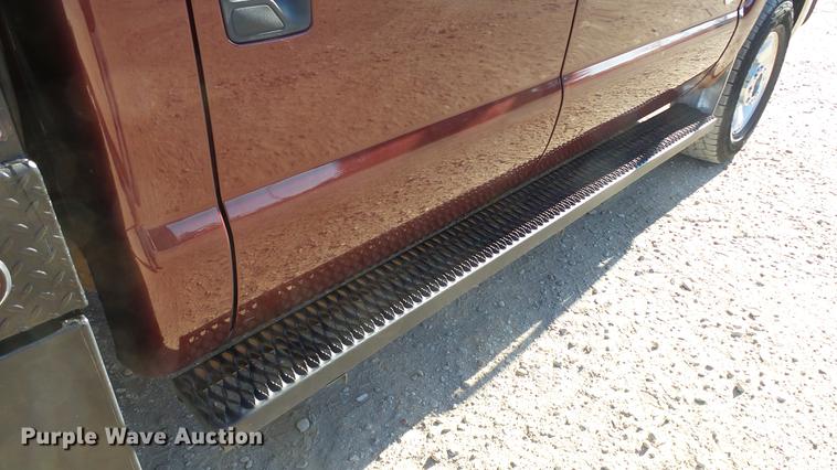 image for item DC0504 2013 Ford F350 Super Duty Crew Cab flatbed pickup truck