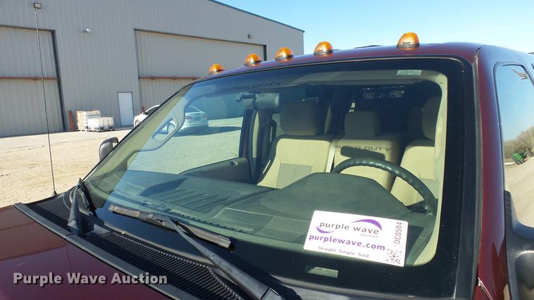 image for item DC0504 2013 Ford F350 Super Duty Crew Cab flatbed pickup truck