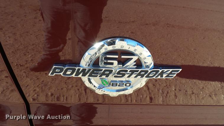 image for item DC0504 2013 Ford F350 Super Duty Crew Cab flatbed pickup truck