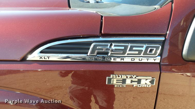 image for item DC0504 2013 Ford F350 Super Duty Crew Cab flatbed pickup truck