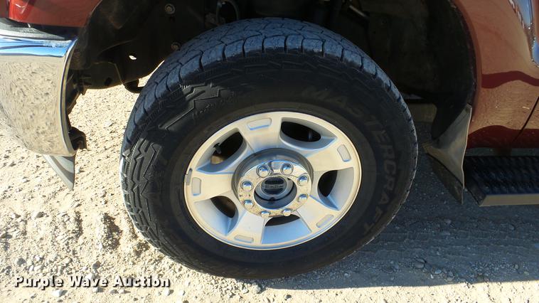 image for item DC0504 2013 Ford F350 Super Duty Crew Cab flatbed pickup truck