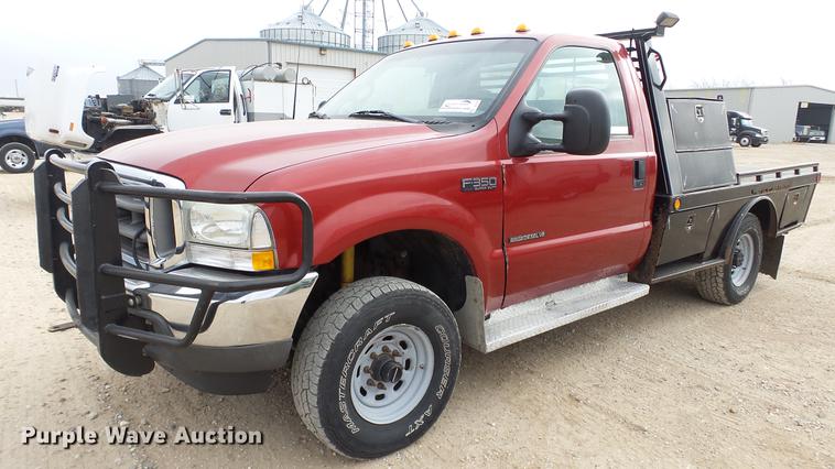 image for item DC2351 2002 Ford F350 Super Duty XLT flatbed pickup truck