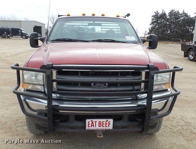 image for item DC2351 2002 Ford F350 Super Duty XLT flatbed pickup truck