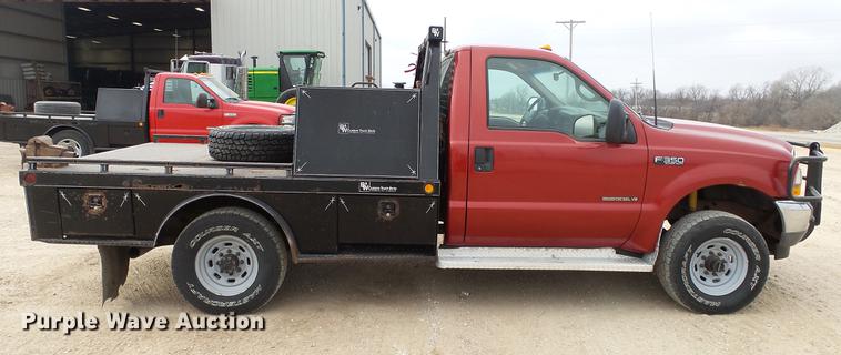 image for item DC2351 2002 Ford F350 Super Duty XLT flatbed pickup truck
