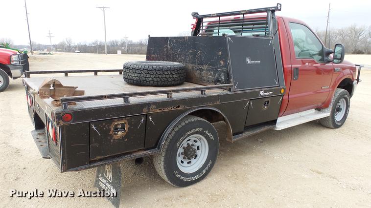 image for item DC2351 2002 Ford F350 Super Duty XLT flatbed pickup truck
