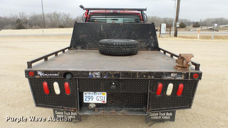 image for item DC2351 2002 Ford F350 Super Duty XLT flatbed pickup truck