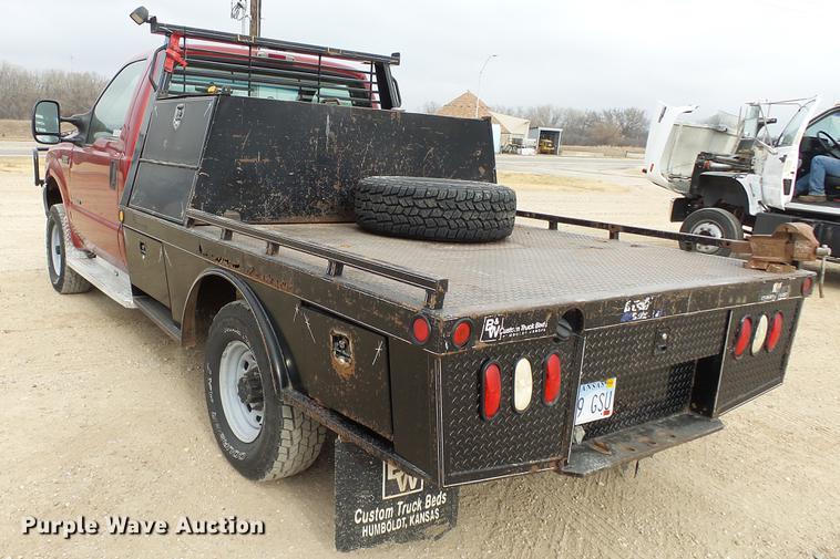 image for item DC2351 2002 Ford F350 Super Duty XLT flatbed pickup truck