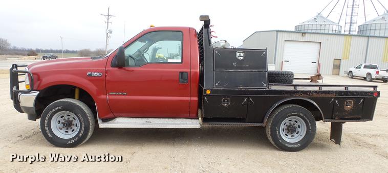 image for item DC2351 2002 Ford F350 Super Duty XLT flatbed pickup truck