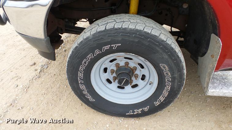 image for item DC2351 2002 Ford F350 Super Duty XLT flatbed pickup truck