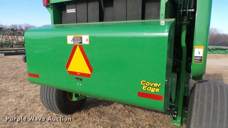 image for item DC2367 2013 John Deere 569 Premium round baler
