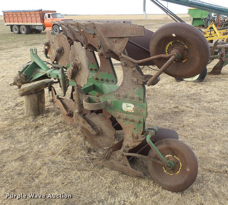 image for item DC8410 John Deere four bottom plow