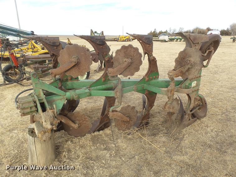 image for item DC8410 John Deere four bottom plow
