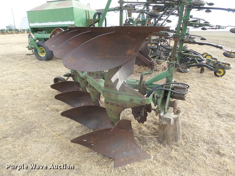 image for item DC8410 John Deere four bottom plow