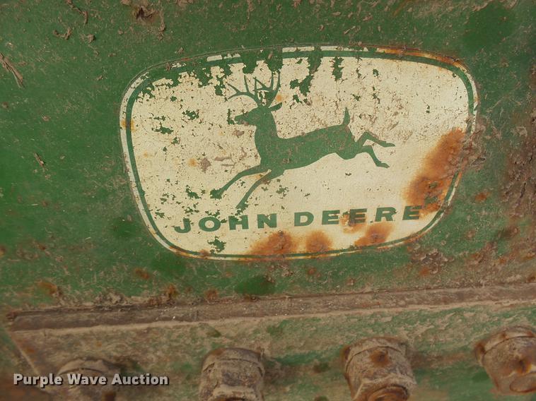 image for item DC8410 John Deere four bottom plow