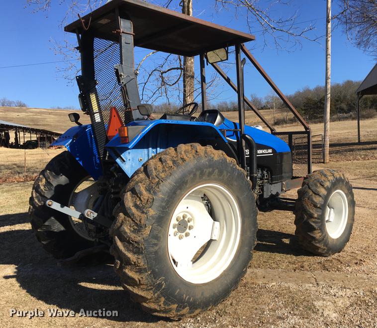 image for item G1024 2001 New Holland TS110 MFWD tractor