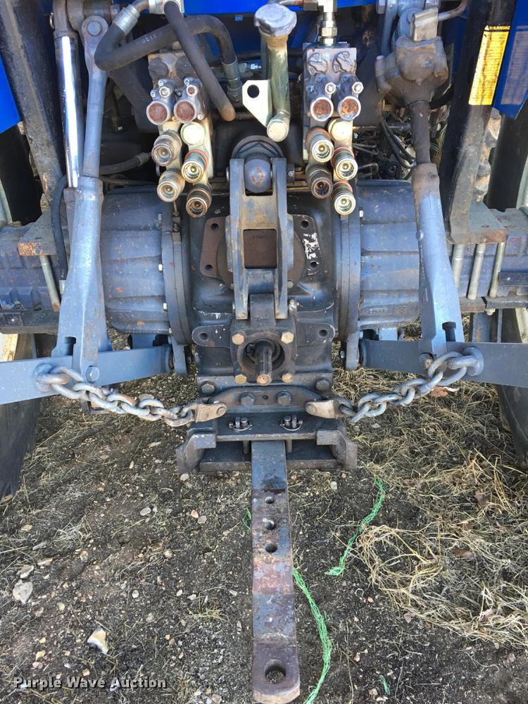image for item G1024 2001 New Holland TS110 MFWD tractor