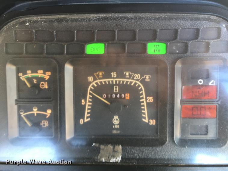 image for item G1024 2001 New Holland TS110 MFWD tractor