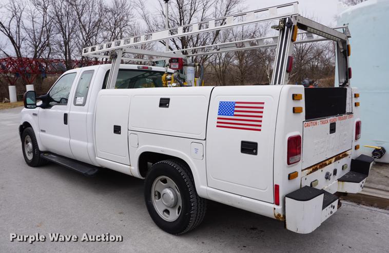 image for item DB0376 2006 Ford F350 Super Duty SuperCab utility bed pickup truck