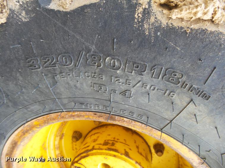 image for item DB7302 2002 John Deere 310 SG backhoe