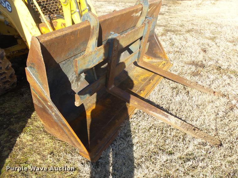 image for item DB7302 2002 John Deere 310 SG backhoe