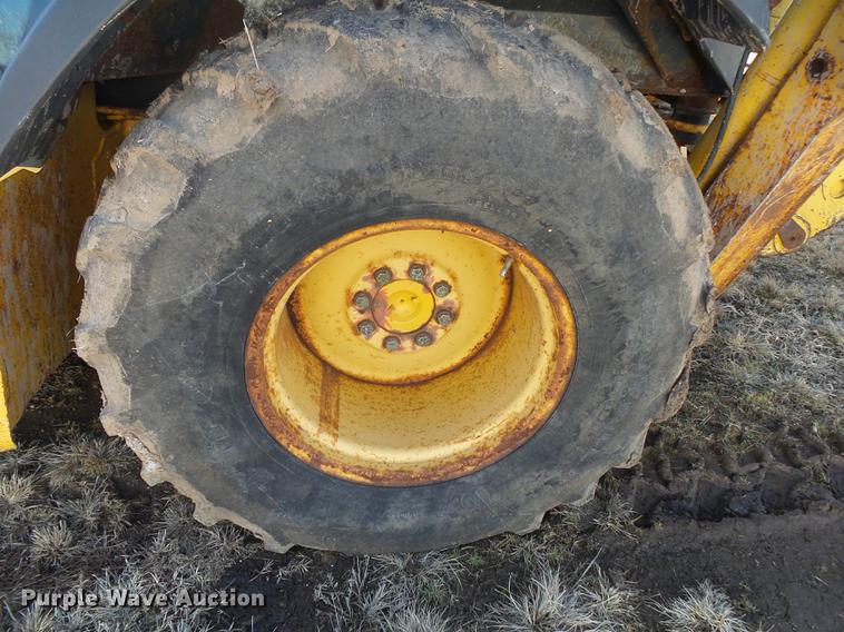 image for item DB7302 2002 John Deere 310 SG backhoe