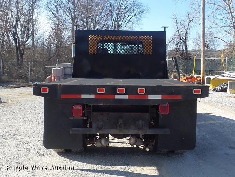 image for item DC7438 2000 International 4900 flatbed truck