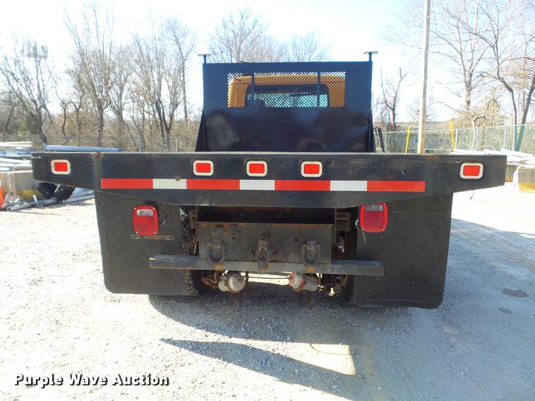 image for item DC7438 2000 International 4900 flatbed truck