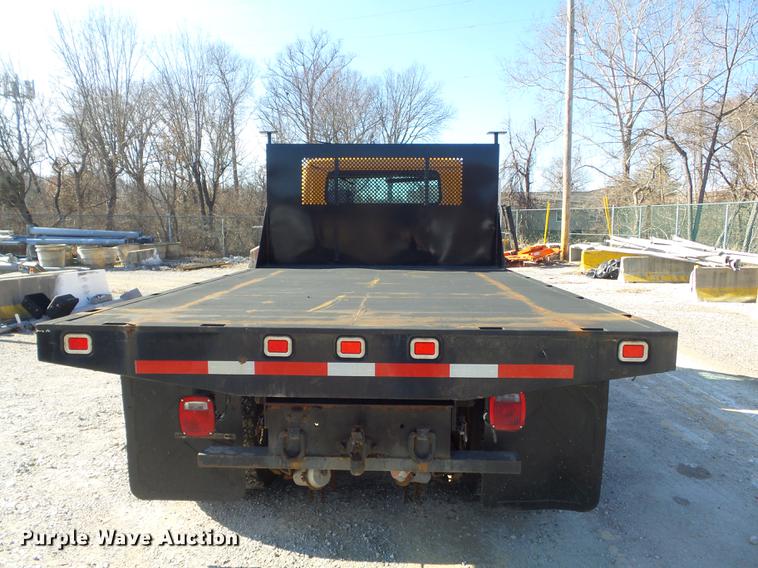 image for item DC7438 2000 International 4900 flatbed truck