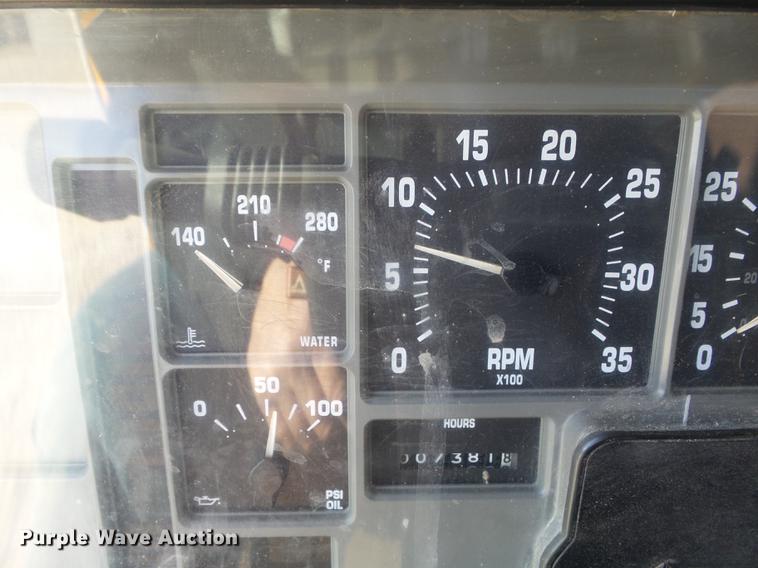 image for item DC7438 2000 International 4900 flatbed truck