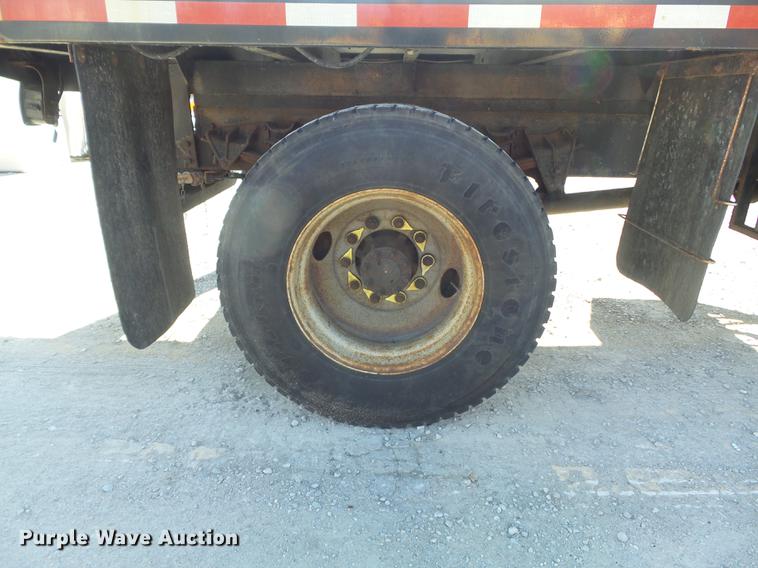 image for item DC7438 2000 International 4900 flatbed truck