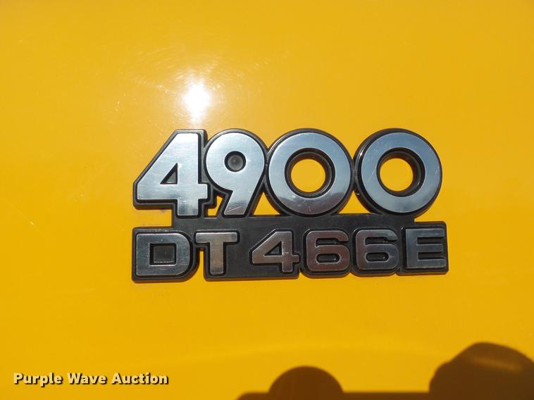 image for item DC7438 2000 International 4900 flatbed truck