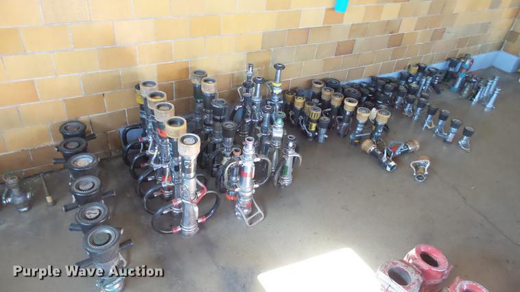 image for item EF9347 Approximately 90 fire hose nozzles